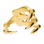 Guld ring med kløer